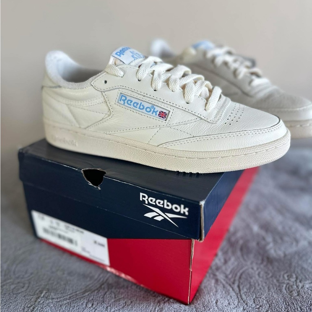 Reebok Cream Sneakers with Blue Accents
